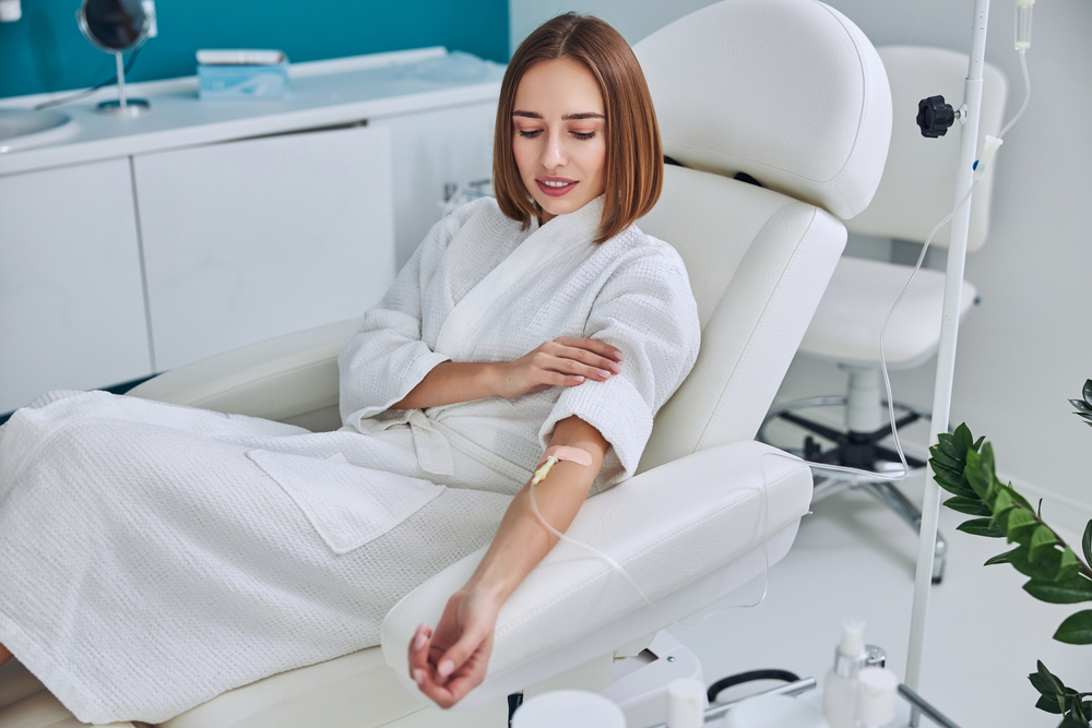 woman getting IV therapy