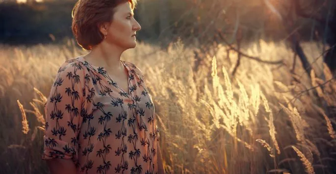 woman standing in field