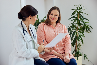 doctor meets with weight loss patient