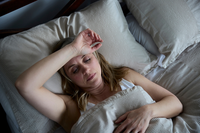 woman having trouble sleeping